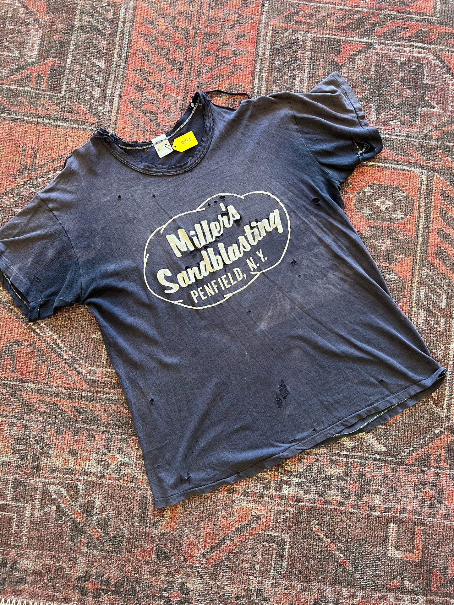 Thrashed vintage Miller’s Sandblasting tshirt