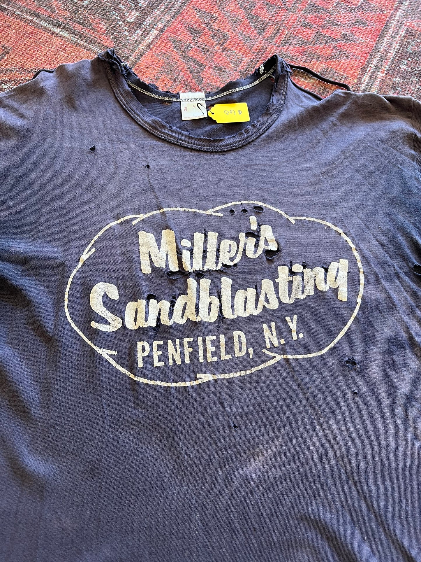 Thrashed vintage Miller’s Sandblasting tshirt